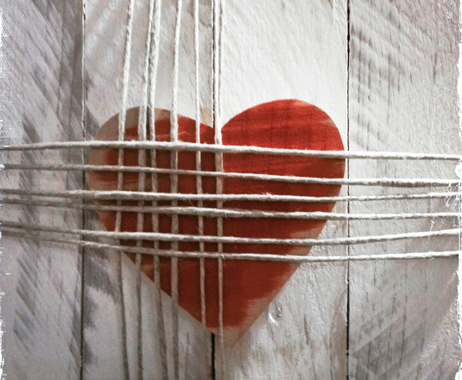 Heart captured by strings tied up
